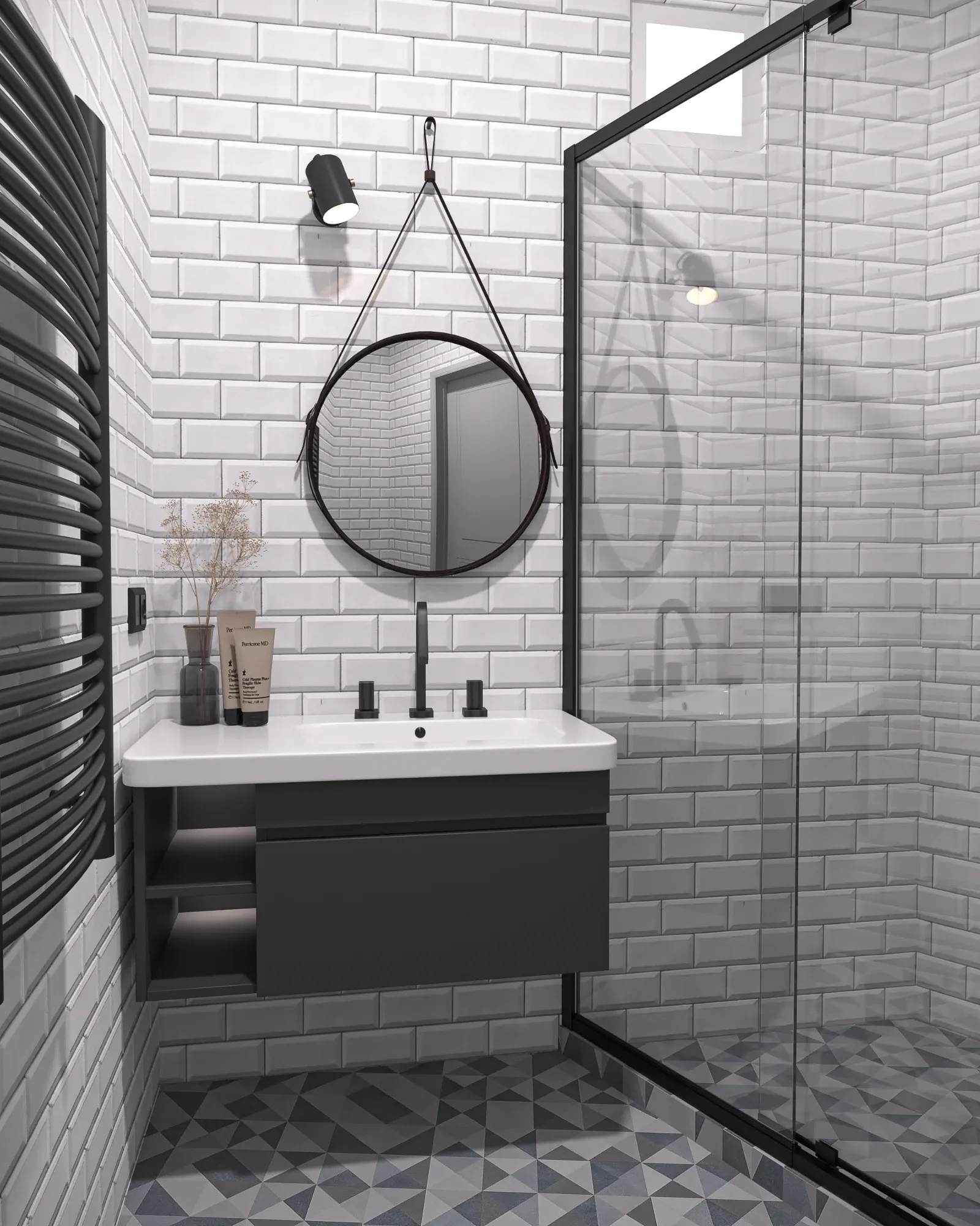 Shower room tiled in white bevelled metro tile, with a round leather-strap mirror, charcoal wall-hung vanity, black towel radiator and a geometric patterned floor.